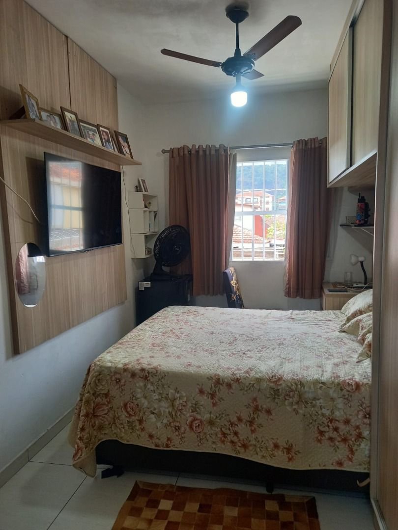 Casa com 3 dormitórios à venda, 110 m² por R$ 590.000,00 - Jardim Paraíso - São Vicente/SP
