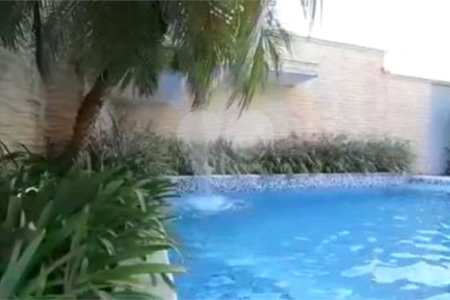 Casa à venda com 5 suítes no condomínio Parque Arco Iris, Atibaia - SP