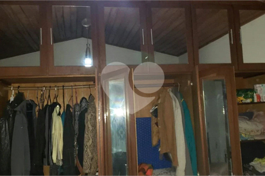 Casa à venda com 4 suítes no condomínio Alpes da Cantareira, Mairiporã - SP