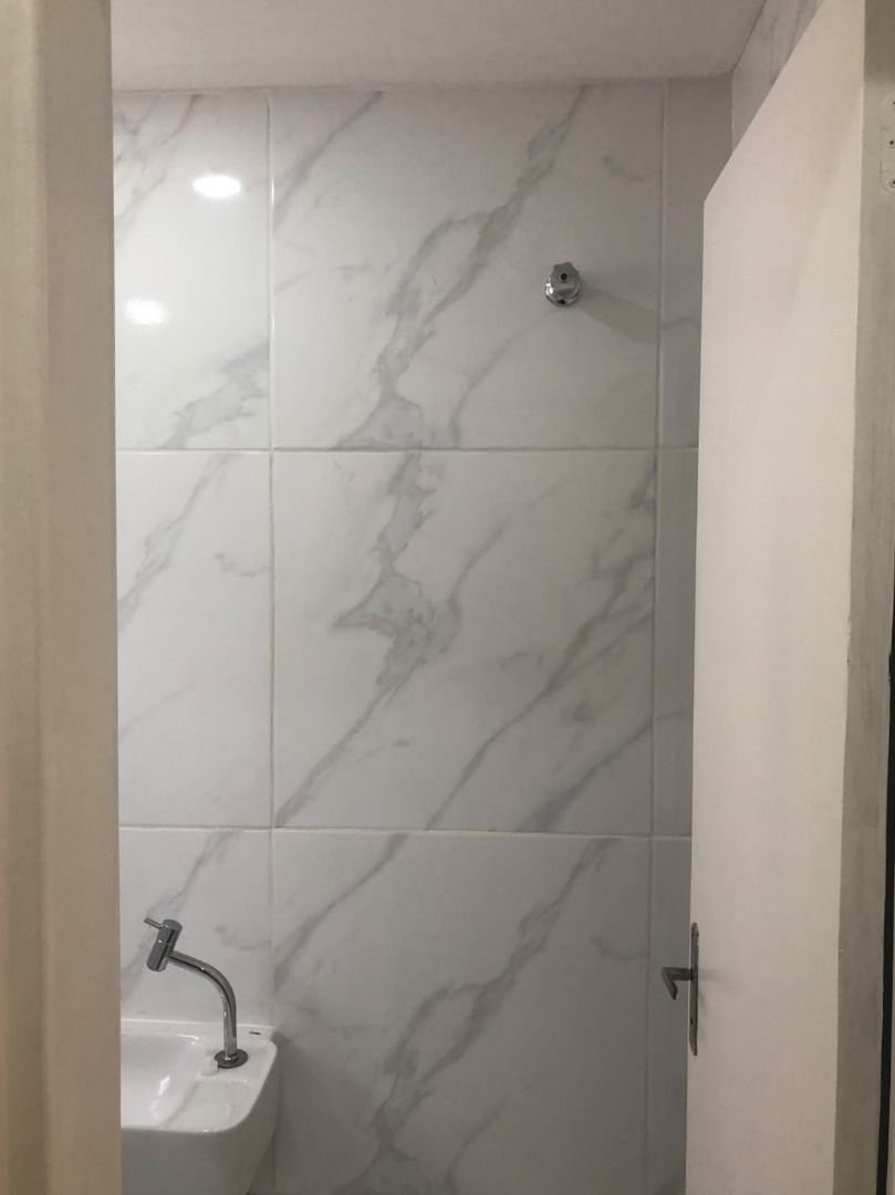 Casa com 3 dormitórios à venda, 116 m² por R$ 690.000,00 - Gonzaga - Santos/SP