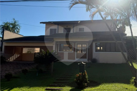 Casa para alugar com 4 quartos, sendo 2 suítes, no condomínio Estância Marambaia, Vinhedo - SP