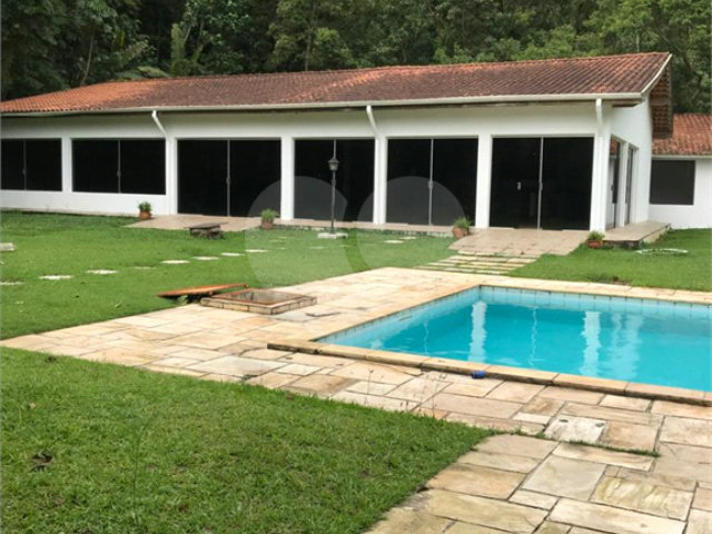 Casa à venda com 4 suítes no condomínio Alpes da Cantareira, Mairiporã - SP