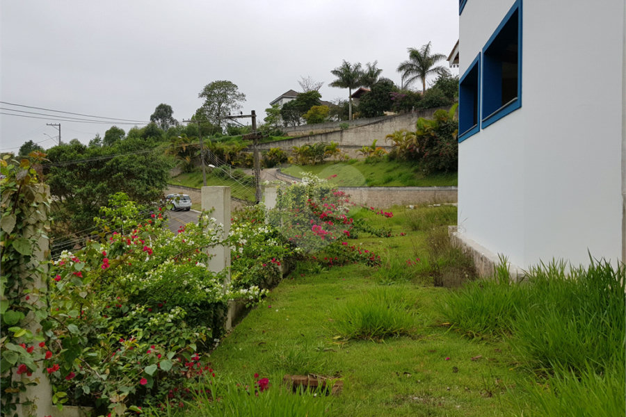 Casa à venda com 4 suítes no condomínio Suíça da Cantareira, Mairiporã - SP