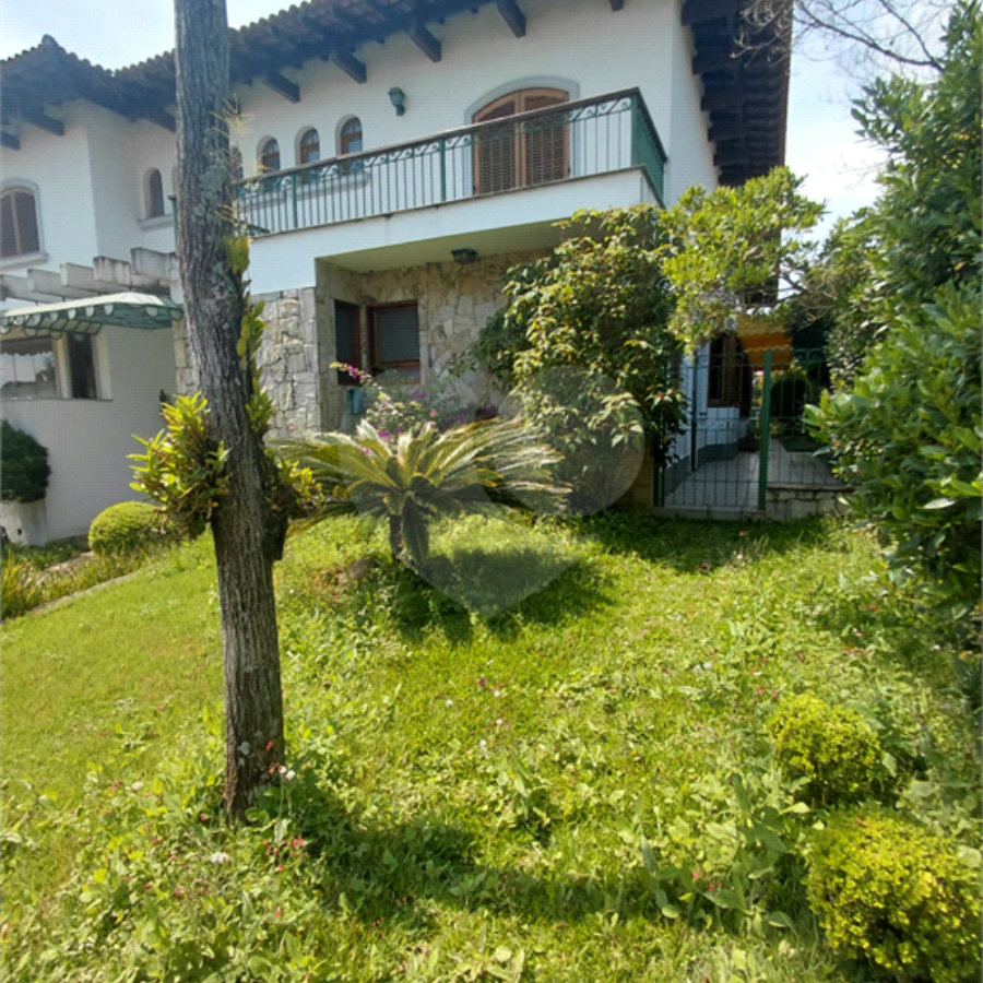 Casa à venda com 4 suítes no condomínio Ville Bourghese, São Paulo - SP