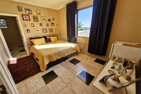Casa à venda com 4 suítes no condomínio Villa Viana II, Cotia - SP