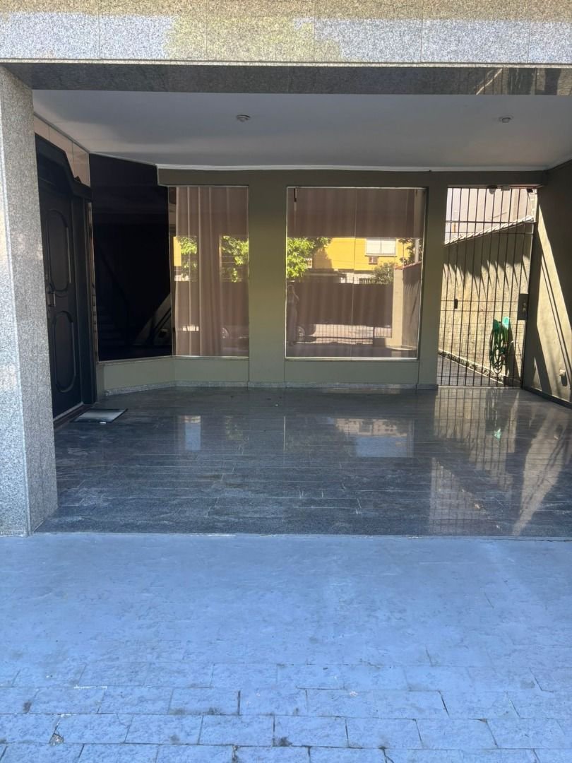 Casa com 3 dormitórios à venda, 330 m² por R$ 2.770.000,00 - Ponta da Praia - Santos/SP