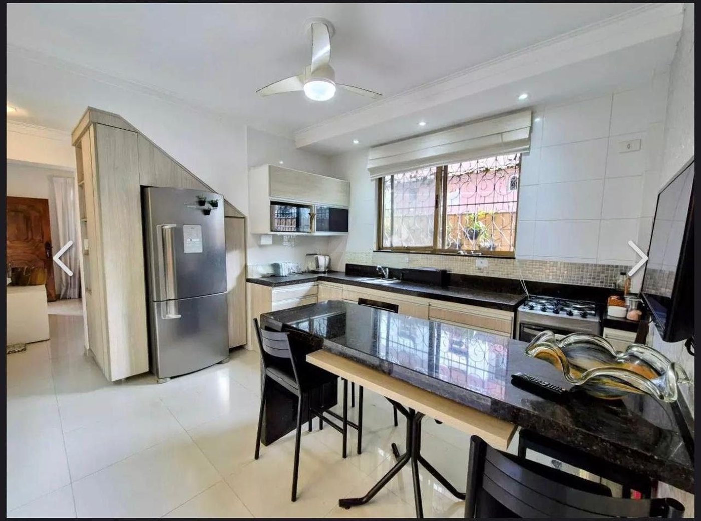 Casa com 4 dormitórios à venda, 127 m² por R$ 1.440.000,00 - Ponta da Praia - Santos/SP