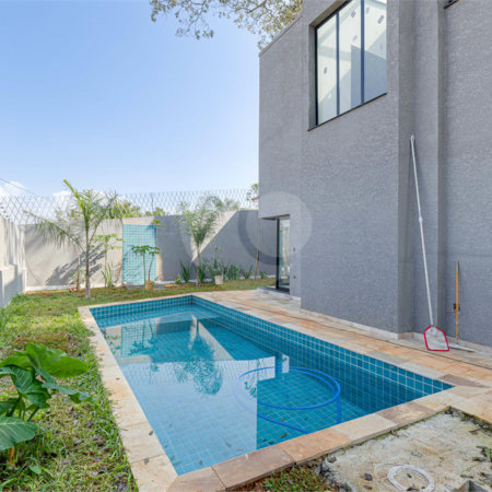 Casa à venda com 4 suítes no condomínio Reserva Robélia, São Paulo - SP
