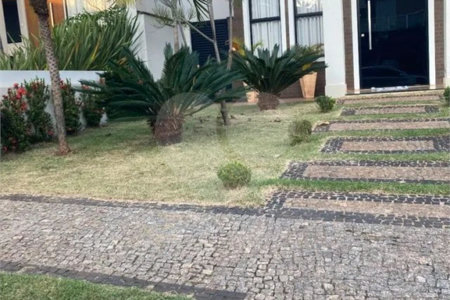 Casa à venda com 3 suítes no condomínio Terras do Cancioneiro, Paulínia - SP