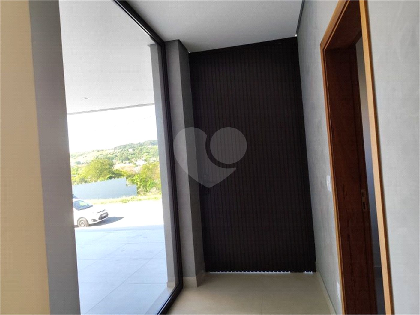 Casa à venda com 3 suítes no condomínio Recanto das Palmas, Vinhedo - SP