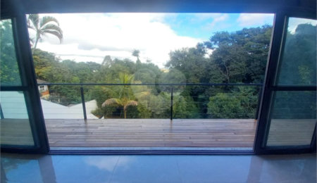 Casa à venda com 4 suítes no condomínio Estância Marambaia, Vinhedo - SP