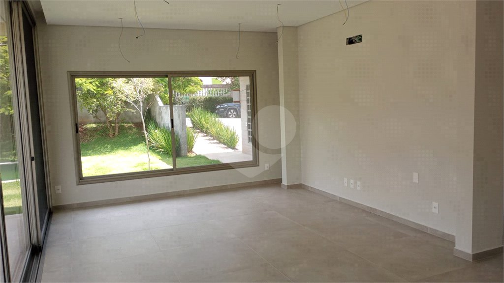Casa à venda com 4 suítes no condomínio Estância Marambaia, Vinhedo - SP