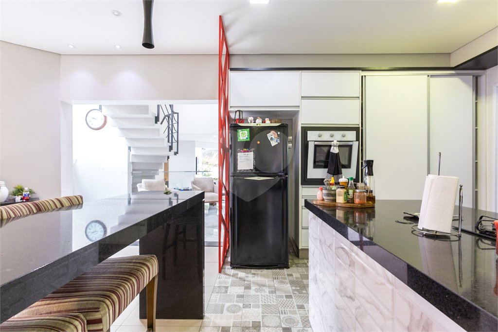 Casa à venda com 4 suítes no condomínio Villa Castanheira, São Paulo - SP
