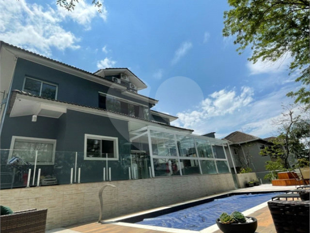 Casa à venda ou para alugar com 3 suítes no condomínio Suíça da Cantareira, Mairiporã - SP
