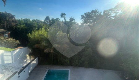 Casa à venda com 4 suítes no condomínio Estância Marambaia, Vinhedo - SP