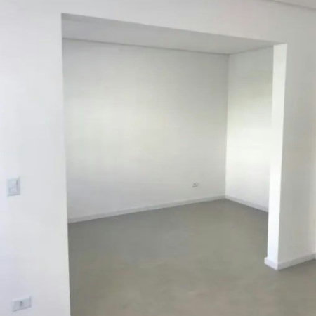 Casa com 3 dormitórios à venda, 116 m² por R$ 690.000,00 - Gonzaga - Santos/SP