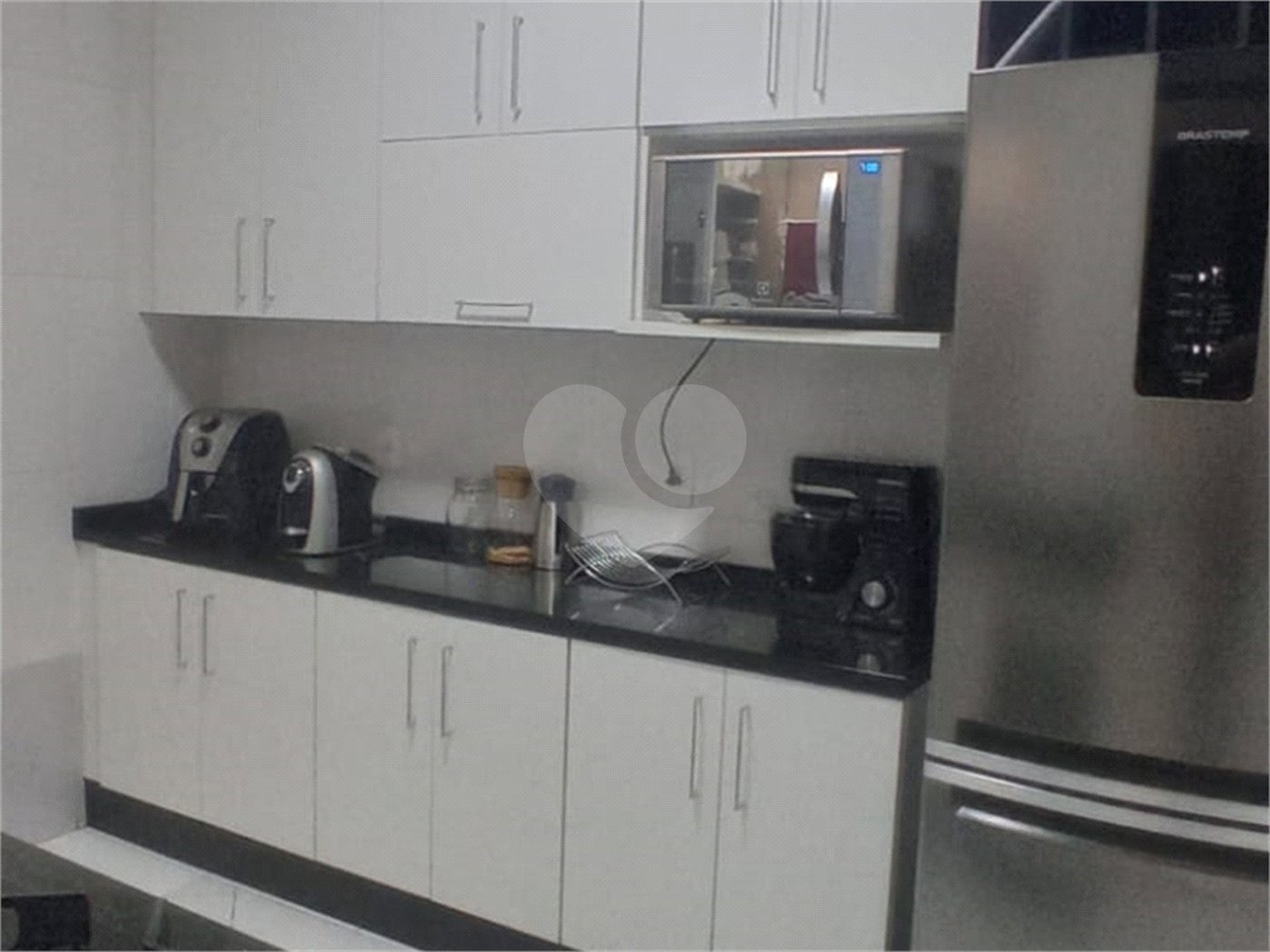Casa à venda com 2 suítes no condomínio Residencial Pavoni I, São Paulo - SP