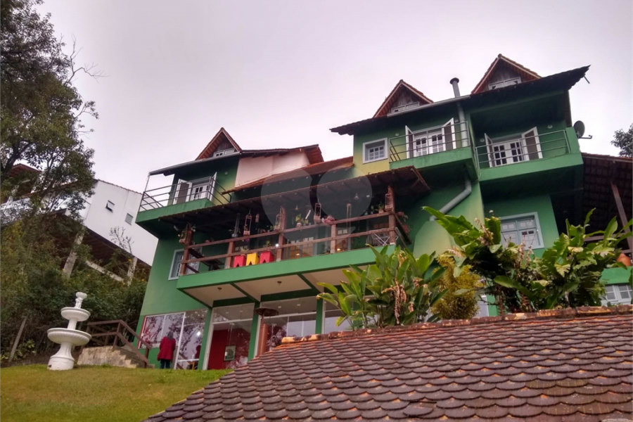 Casa à venda com 4 suítes no condomínio Alpes da Cantareira, Mairiporã - SP