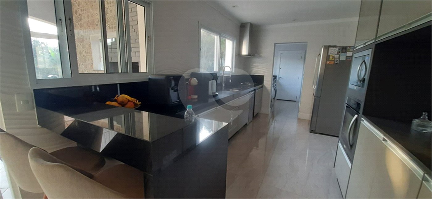 Casa à venda com 4 suítes no condomínio Suíça da Cantareira, Mairiporã - SP