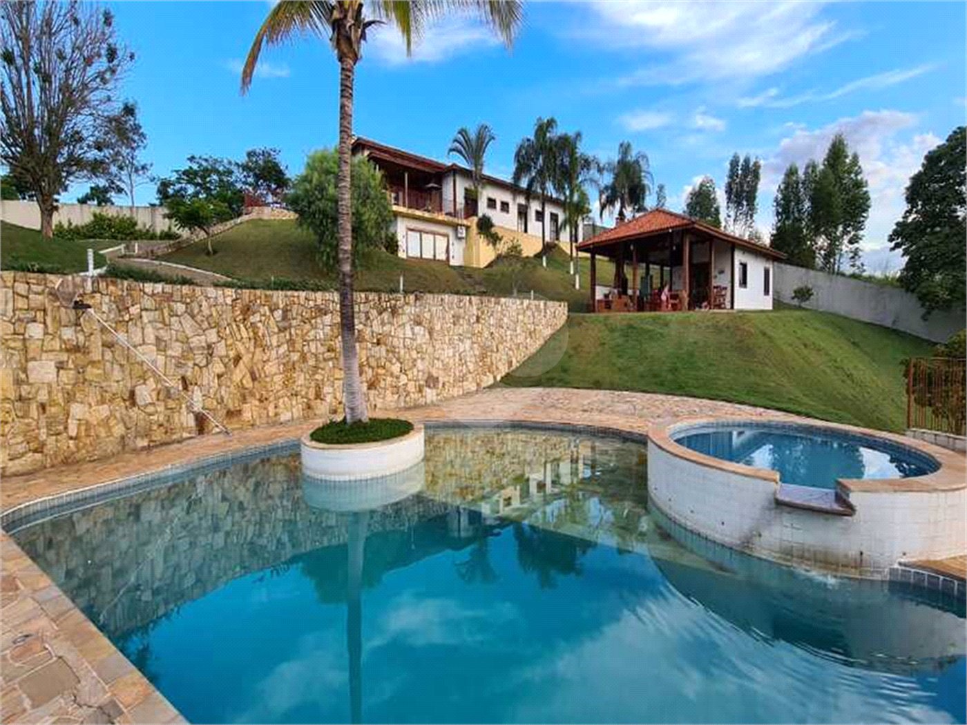 Casa à venda com 4 suítes no condomínio Parque da Fazenda, Itatiba - SP