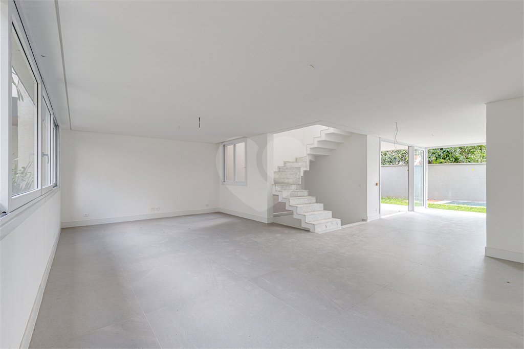 Casa à venda com 4 suítes no condomínio Vila Arese, São Paulo - SP