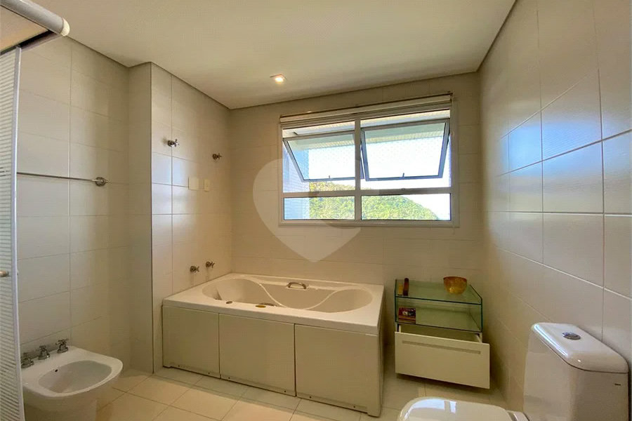 Apartamento à venda com 4 suítes em Riviera de São Lourenço, Bertioga, SP