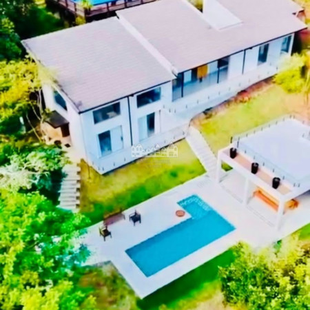 Casa à venda com 4 suítes no condomínio Portal Ouro Verde, Atibaia - SP