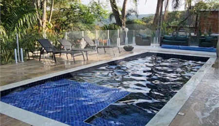 Casa à venda ou para alugar com 3 suítes no condomínio Suíça da Cantareira, Mairiporã - SP