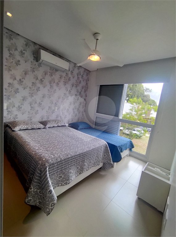 Casa à venda ou para alugar com 4 suítes no condomínio Sambaqui, São Sebastião - SP