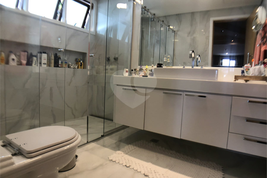 Casa à venda com 4 suítes no condomínio Residencial Floresta, São Paulo - SP