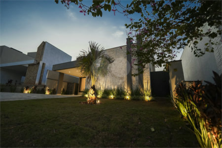 Casa à venda com 4 suítes no condomínio Alphaville Nova Esplanada, Votorantim - SP
