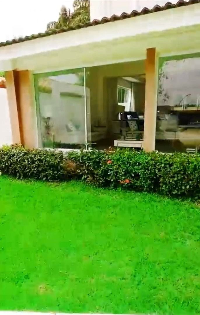 Casa com 5 dormitórios à venda, 900 m² por R$ 15.200.000,00 - Cidade Jardim Tom - Guarujá/SP