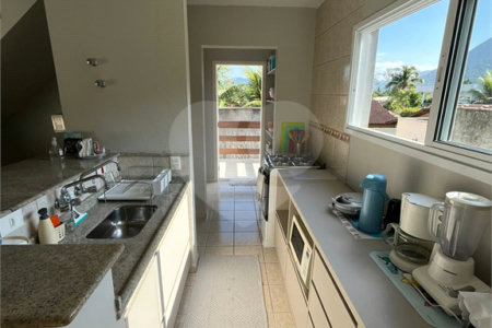 Casa à venda com 2 suítes no condomínio Recanto da Lagoinha, Ubatuba - SP