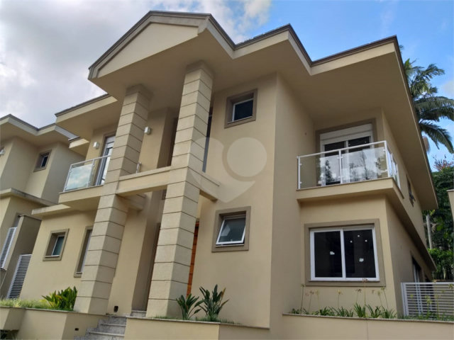 Casa à venda com 4 suítes no condomínio Villagio Di Modena, São Paulo - SP