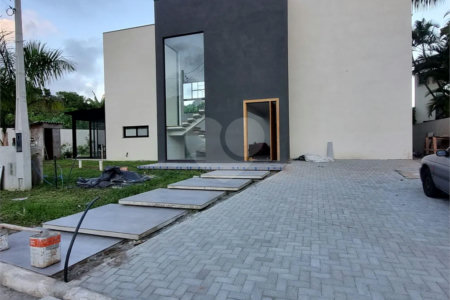 Casa à venda com 4 suítes no condomínio Park Lane, Guarujá - SP