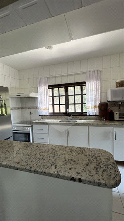 Casa à venda com 3 quartos, sendo 2 suítes, no condomínio Loteamento Haras El Passo, Mairiporã - SP