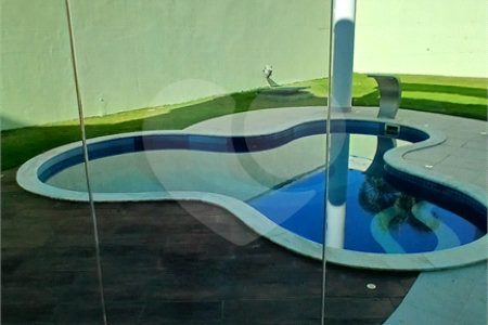 Casa à venda com 3 suítes no condomínio Figueira Garden, Atibaia - SP