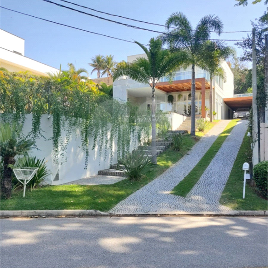 Casa à venda com 4 quartos, sendo 3 suítes, no condomínio Estância Marambaia, Vinhedo - SP