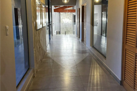 Casa à venda com 4 suítes no condomínio Portal Ouro Verde, Atibaia - SP