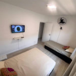 Casa com 3 dormitórios, 249 m² - venda por R$ 1.480.000,00 ou aluguel por R$ 7.600,00 - Marapé - Santos/SP