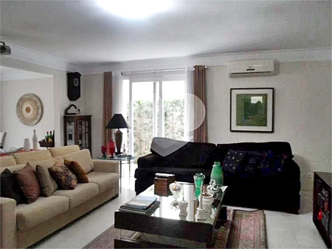 Casa à venda com 4 suítes no condomínio Chácara das Rosas, São Paulo - SP