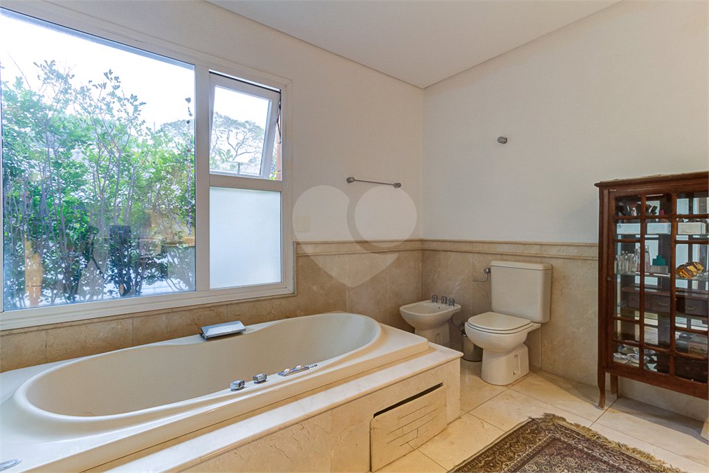 Casa à venda com 4 suítes no condomínio Vila Verde, São Paulo - SP