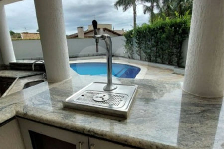 Casa à venda com 4 suítes no condomínio Reserva Colonial, Valinhos - SP