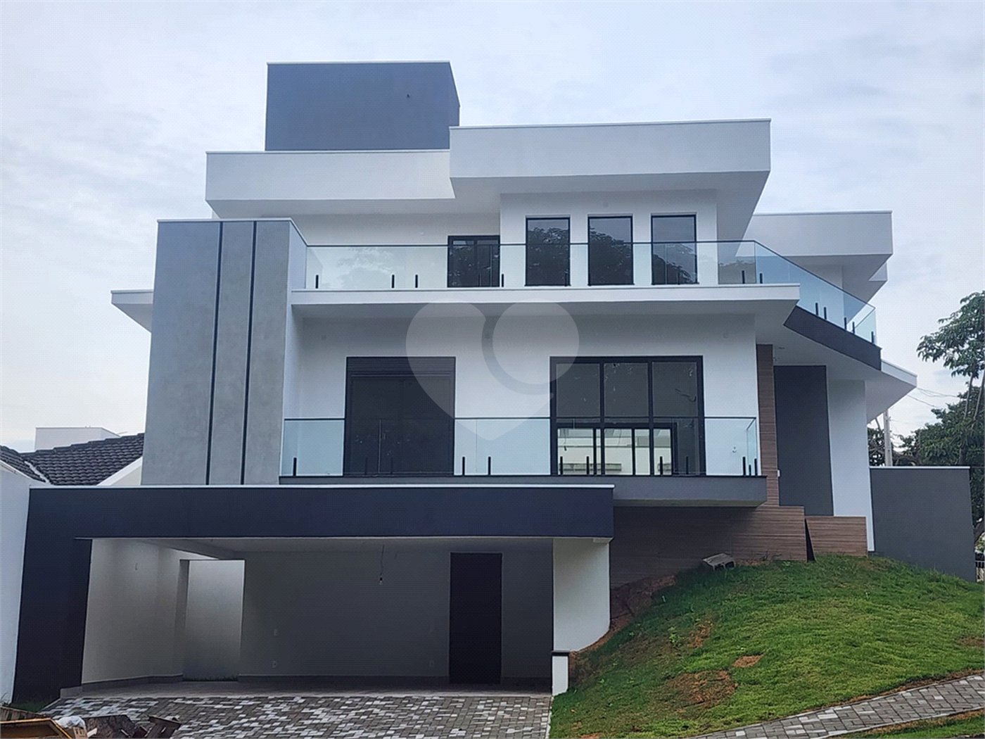 Casa à venda com 3 suítes no condomínio Terras de São Francisco, Vinhedo - SP