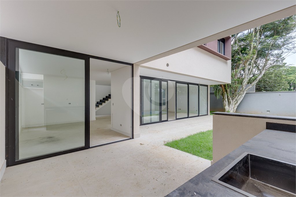 Casa à venda com 4 suítes no condomínio Garda, São Paulo - SP