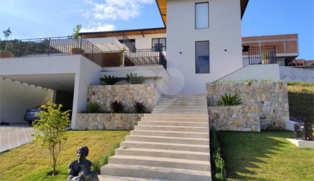 Casa à venda ou para alugar com 4 suítes no condomínio Itaporã, Atibaia - SP