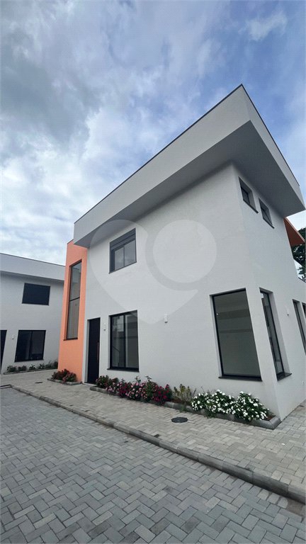 Casa à venda com 3 suítes no condomínio Village Itaguaçu, Atibaia - SP