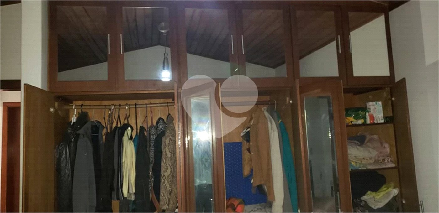 Casa à venda com 4 suítes no condomínio Alpes da Cantareira, Mairiporã - SP