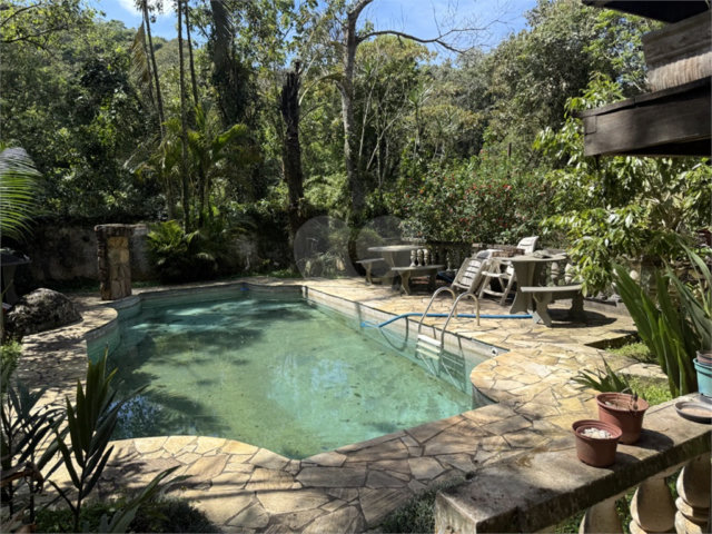 Casa à venda com 4 quartos no condomínio Parque Suiça, Caieiras - SP