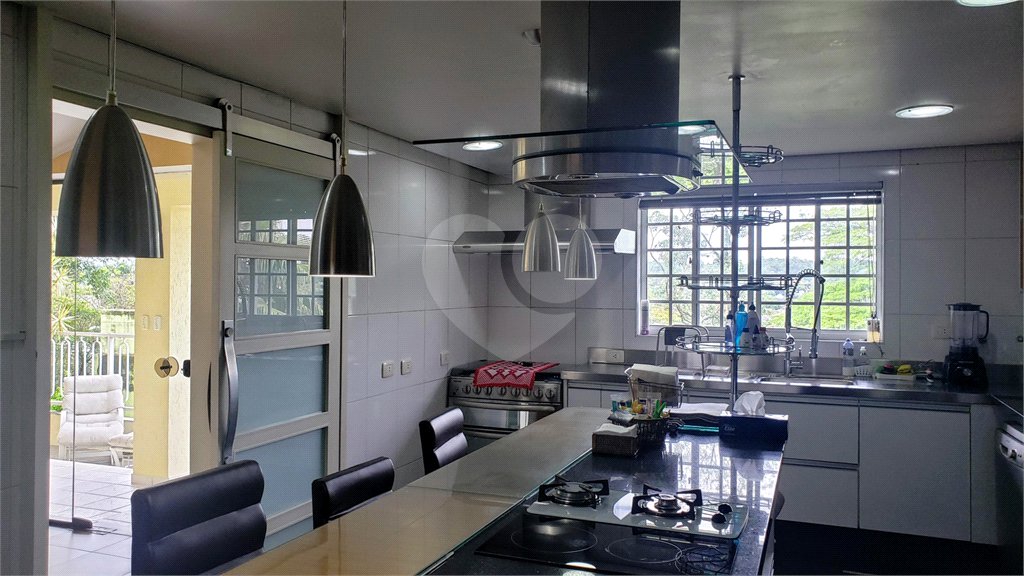 Casa à venda com 4 suítes no condomínio Espaço Natureza, São Paulo - SP